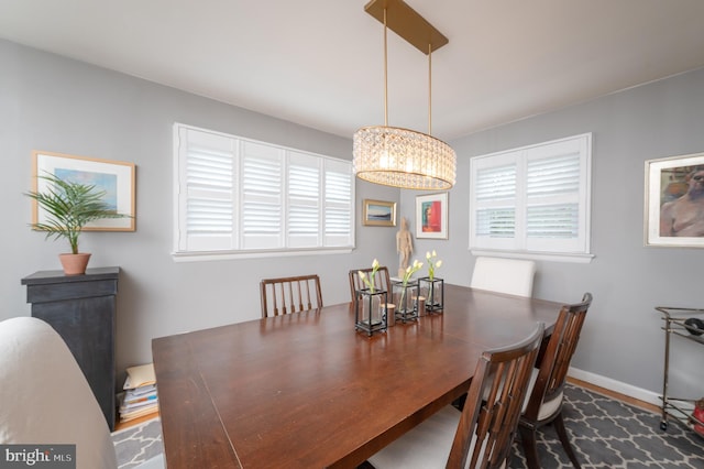 1909 Bloomingdale Ave, Lancaster, PA 17601 - dining space with a chandelier, wood finished floors, and baseboards