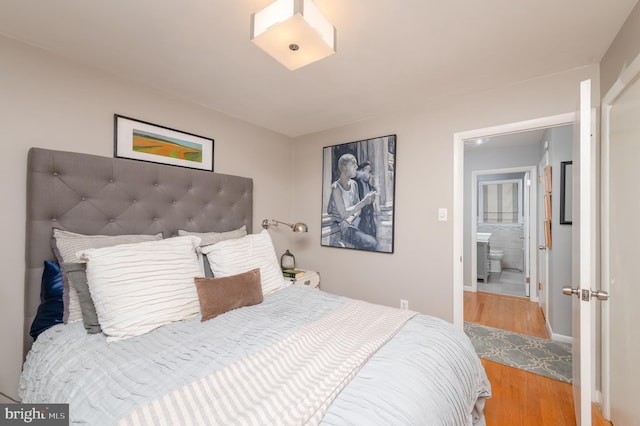 1909 Bloomingdale Ave, Lancaster, PA 17601 - bedroom with wood finished floors and baseboards