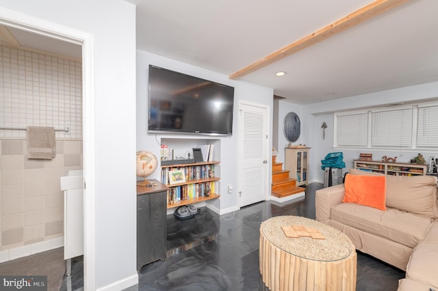 1909 Bloomingdale Ave, Lancaster, PA 17601 - living area with stairway, baseboards, concrete flooring, and recessed lighting