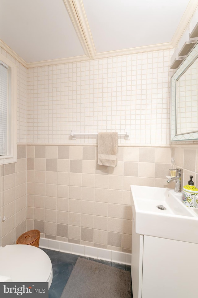 1909 Bloomingdale Ave, Lancaster, PA 17601 - half bathroom featuring tile walls, vanity, toilet, and crown molding