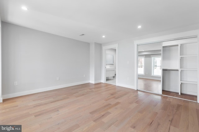 2100 S Pierce St, Arlington, VA 22202 - unfurnished bedroom featuring light wood-style flooring, recessed lighting, baseboards, and ensuite bath