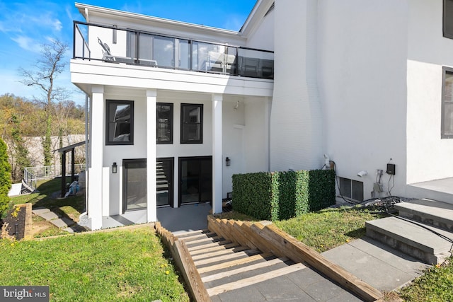 2100 S Pierce St, Arlington, VA 22202 - view of front of home featuring a balcony and stucco siding