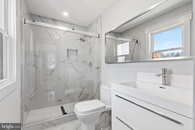 2100 S Pierce St, Arlington, VA 22202 - full bathroom featuring toilet, a marble finish shower, vanity, marble look tile flooring, and recessed lighting