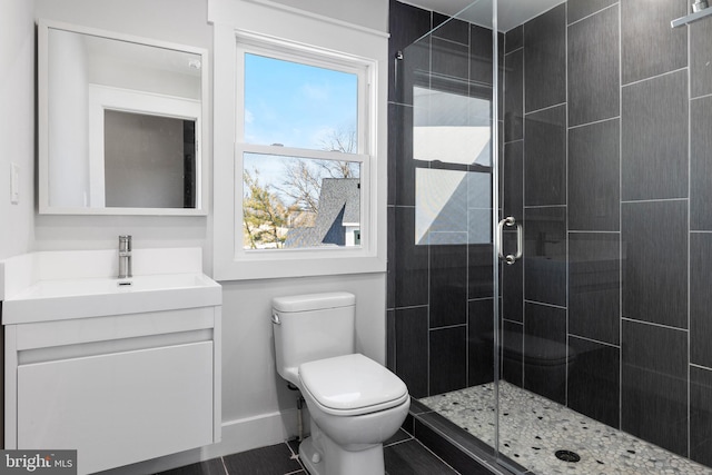 2100 S Pierce St, Arlington, VA 22202 - bathroom with a shower stall, toilet, vanity, and baseboards
