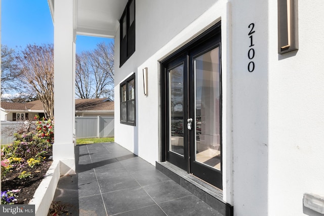 2100 S Pierce St, Arlington, VA 22202 - entrance to property with stucco siding and fence