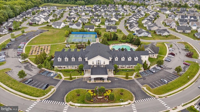 view of property location featuring a pool