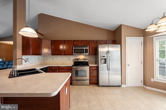 81 Toulouse Ln, Martinsburg, WV 25403 - kitchen featuring appliances with stainless steel finishes, a sink, light countertops, decorative backsplash, and high vaulted ceiling