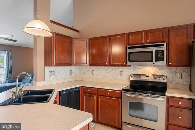 81 Toulouse Ln, Martinsburg, WV 25403 - kitchen featuring stainless steel appliances, a sink, light countertops, and tasteful backsplash