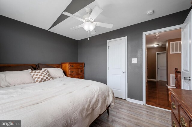 81 Toulouse Ln, Martinsburg, WV 25403 - bedroom with light wood-style flooring, baseboards, and a ceiling fan