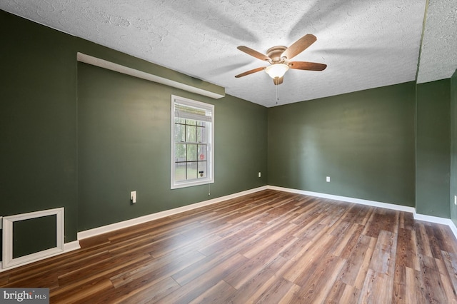 81 Toulouse Ln, Martinsburg, WV 25403 - unfurnished room with wood finished floors, ceiling fan, a textured ceiling, and baseboards