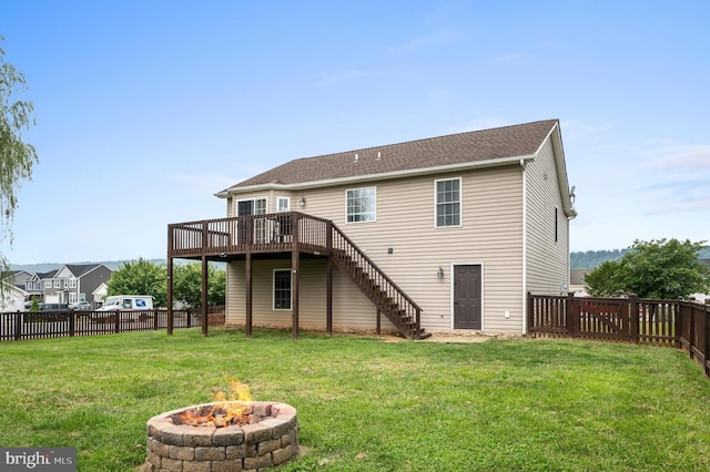 81 Toulouse Ln, Martinsburg, WV 25403 - back of property featuring stairs, a wooden deck, and an outdoor fire pit