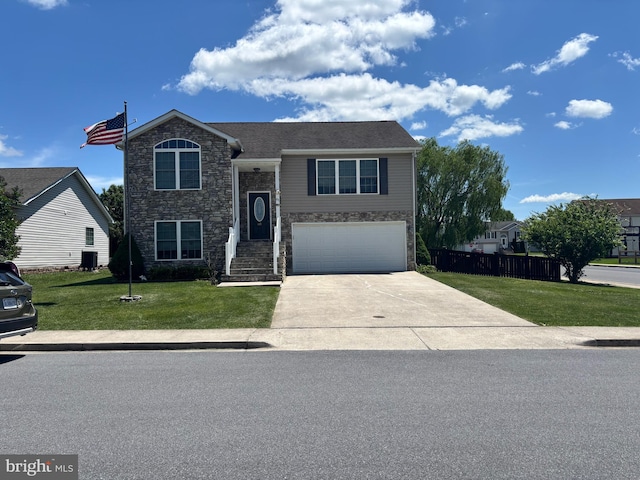 81 Toulouse Ln, Martinsburg, WV 25403 - bi-level home featuring stone siding, a garage, and concrete driveway