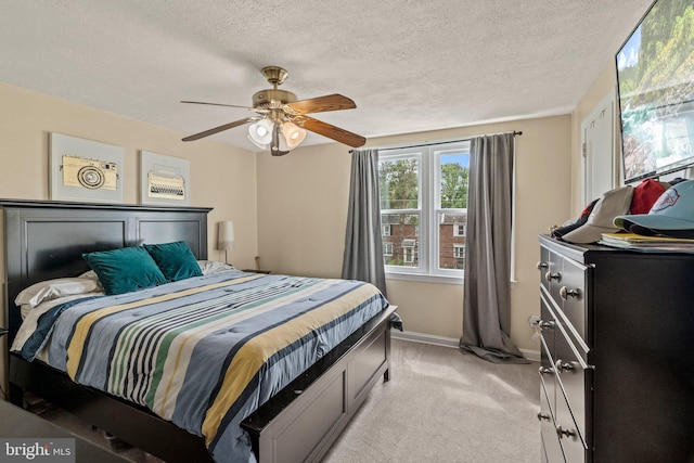 2319 Bond Ave, Drexel Hill, PA 19026 - bedroom featuring light colored carpet, a ceiling fan, baseboards, and a textured ceiling