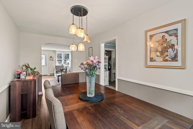 2319 Bond Ave, Drexel Hill, PA 19026 - dining space with arched walkways and wood finished floors