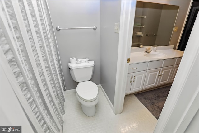 43 Shea Dr, Mohnton, PA 19540 - bathroom featuring toilet, vanity, tile patterned floors, and baseboards