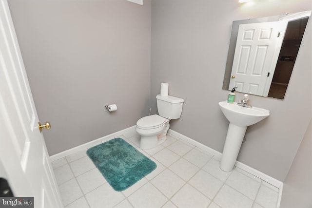 43 Shea Dr, Mohnton, PA 19540 - bathroom with toilet, tile patterned floors, baseboards, and a sink