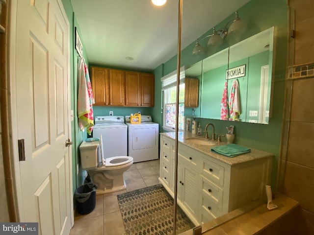 53 Pleasure Shores Cir, Chesapeake City, MD 21915 - bathroom featuring washer and clothes dryer, tile patterned flooring, vanity, and toilet