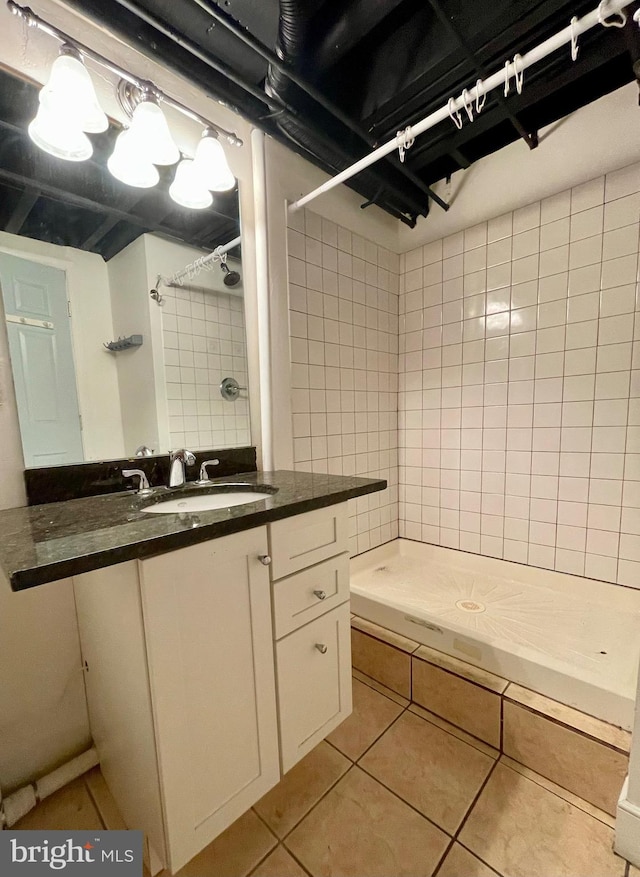 2732 Maryland Ave, Baltimore, MD 21218 - full bath featuring tiled shower, vanity, and tile patterned floors