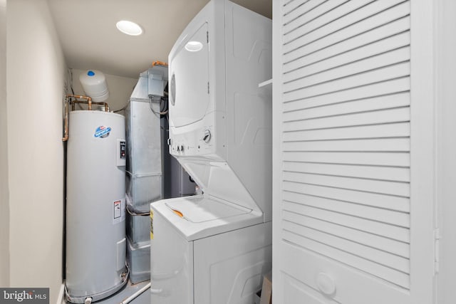 1742 U St NW Unit 101, Washington, DC 20009 - laundry area with stacked washer / dryer and electric water heater
