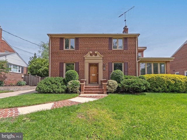 11 S Hudson St, Arlington, VA 22204 - colonial-style house with brick siding and a chimney