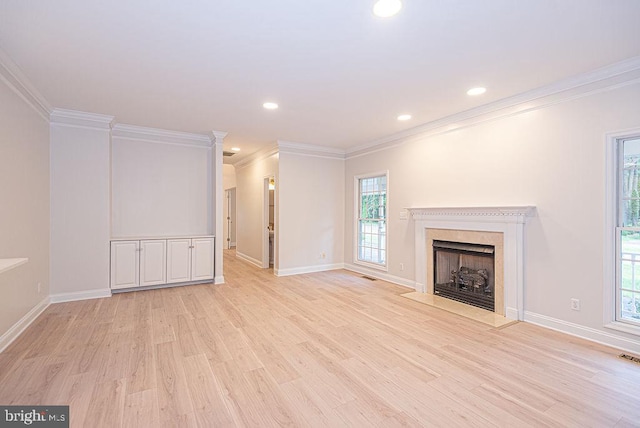 101 Port Arthur Ct, Ocean Pines, MD 21811 - unfurnished living room featuring ornamental molding, light wood-type flooring, baseboards, a premium fireplace, and recessed lighting
