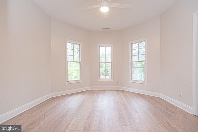 101 Port Arthur Ct, Ocean Pines, MD 21811 - empty room with light wood finished floors, plenty of natural light, ceiling fan, and baseboards