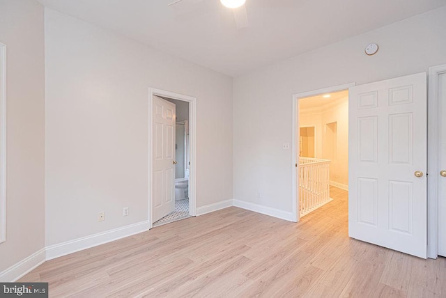 101 Port Arthur Ct, Ocean Pines, MD 21811 - unfurnished bedroom featuring light wood-style floors, baseboards, and ensuite bathroom
