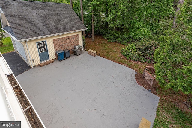 101 Port Arthur Ct, Ocean Pines, MD 21811 - view of patio / terrace with area for grilling and a detached garage