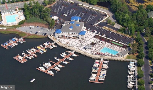 101 Port Arthur Ct, Ocean Pines, MD 21811 - aerial overview of property's location featuring a pool, numerous boat docks, and a large body of water