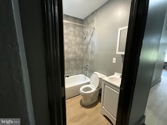 1204 Carl Miller Blvd, Camden, NJ 08104 - bathroom featuring toilet, vanity, bathing tub / shower combination, and wood finished floors