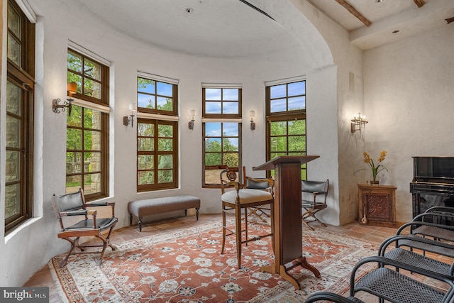 13320 Signal Tree, Potomac, MD 20854 - dining space with arched walkways, a towering ceiling, and a textured wall