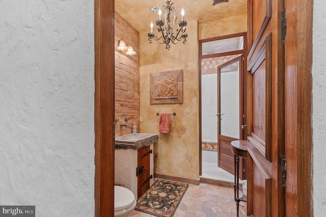 13320 Signal Tree, Potomac, MD 20854 - bathroom with a textured wall, vanity, toilet, and a chandelier