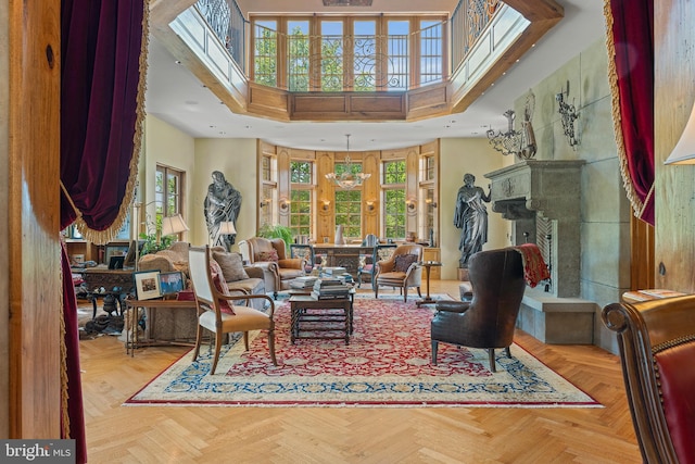 13320 Signal Tree, Potomac, MD 20854 - living area featuring a towering ceiling, healthy amount of natural light, a fireplace with raised hearth, and recessed lighting