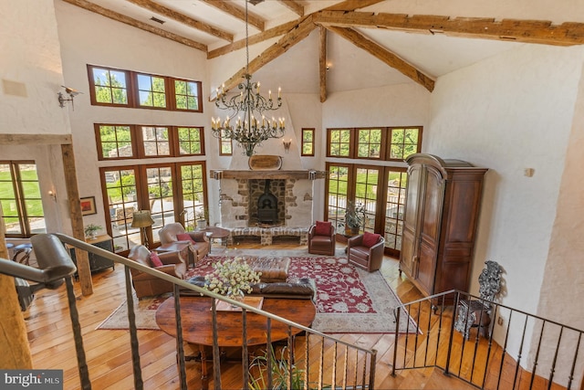 13320 Signal Tree, Potomac, MD 20854 - living room featuring french doors, beamed ceiling, high vaulted ceiling, wood-type flooring, and a chandelier