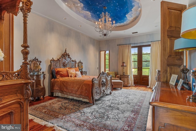 13320 Signal Tree, Potomac, MD 20854 - bedroom featuring wood finished floors, a chandelier, and crown molding
