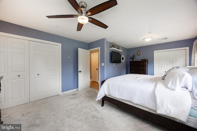 bedroom with carpet floors, baseboards, ceiling fan, and a closet
