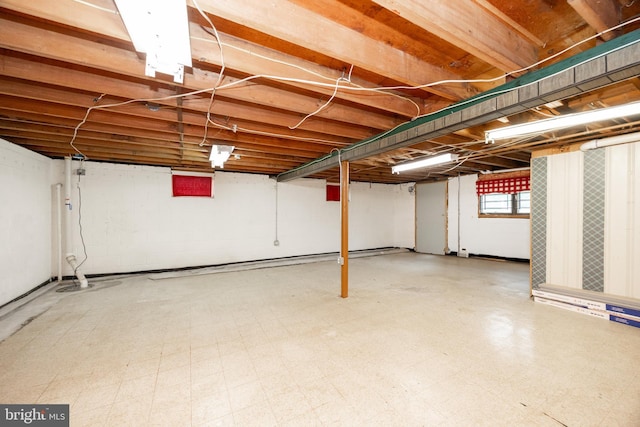 below grade area featuring tile patterned floors