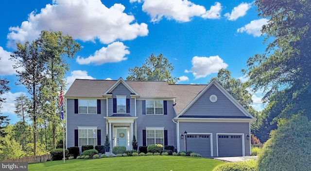 4 Saint Vincent Ct, Stafford, VA 22556 - colonial inspired home featuring a front lawn, an attached garage, and driveway