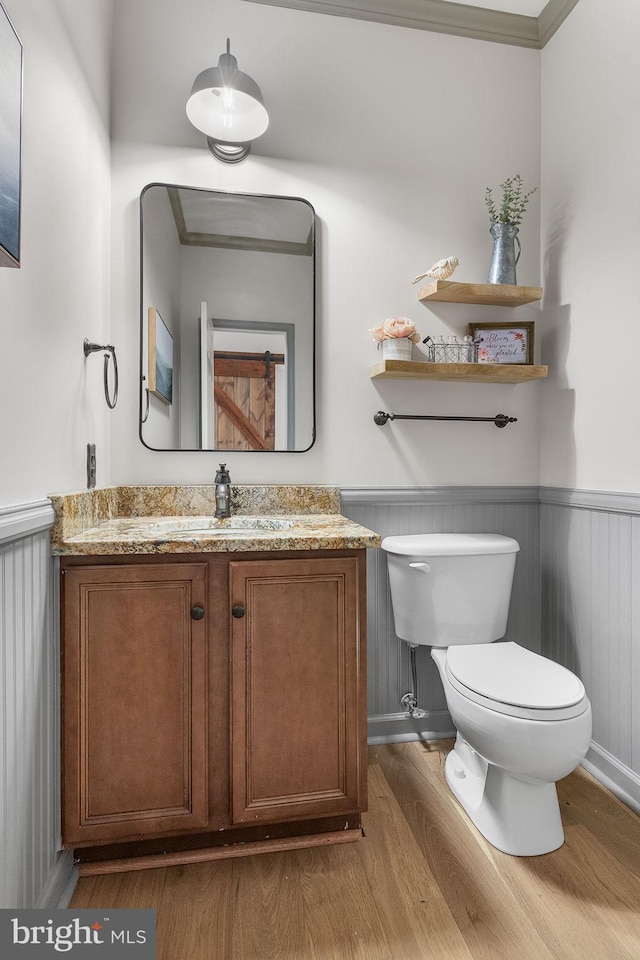 4 Saint Vincent Ct, Stafford, VA 22556 - half bath with wood finished floors, wainscoting, toilet, and vanity