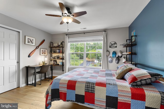 4 Saint Vincent Ct, Stafford, VA 22556 - bedroom with wood finished floors, a ceiling fan, and baseboards
