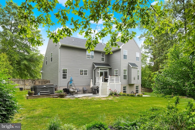 4 Saint Vincent Ct, Stafford, VA 22556 - rear view of property with a patio, a hot tub, stairs, and a deck