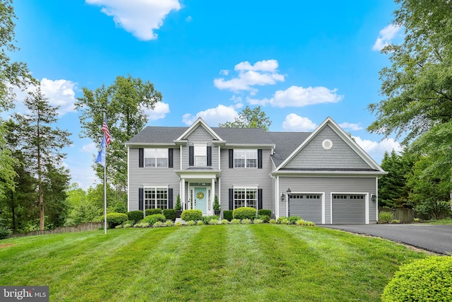 4 Saint Vincent Ct, Stafford, VA 22556 - colonial-style house with driveway and an attached garage