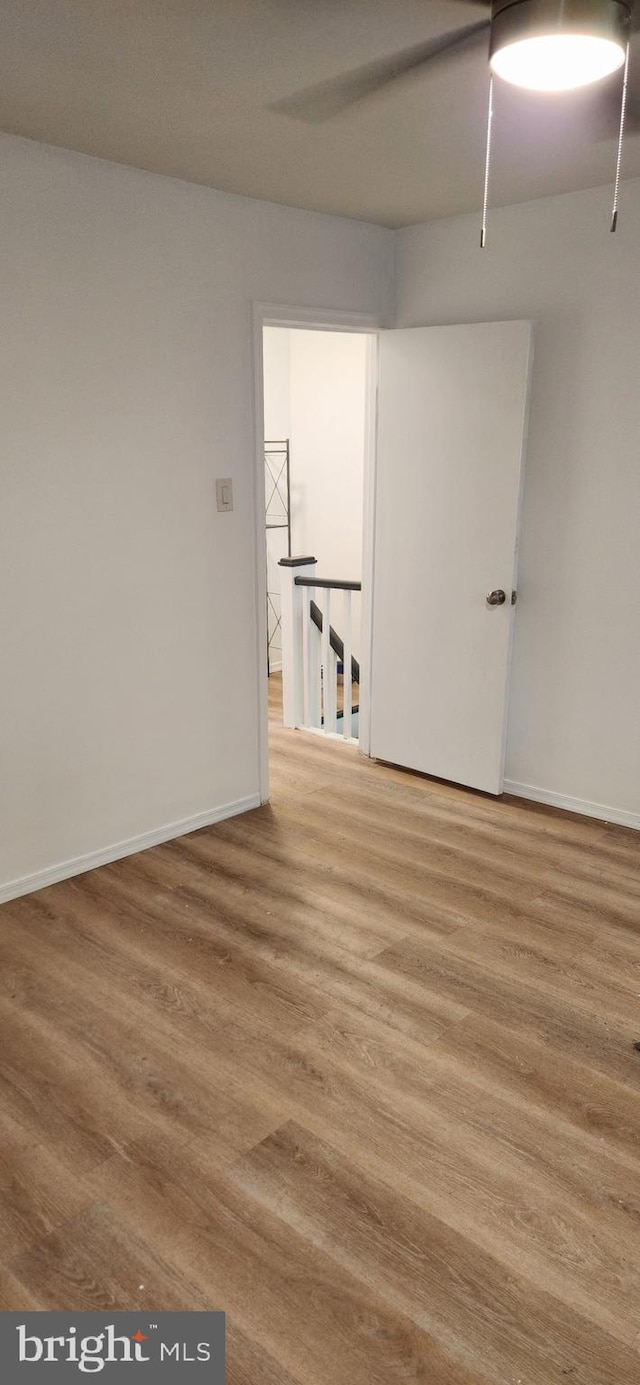 1148 Slocum St, Philadelphia, PA 19150 - unfurnished room featuring wood finished floors, baseboards, and ceiling fan
