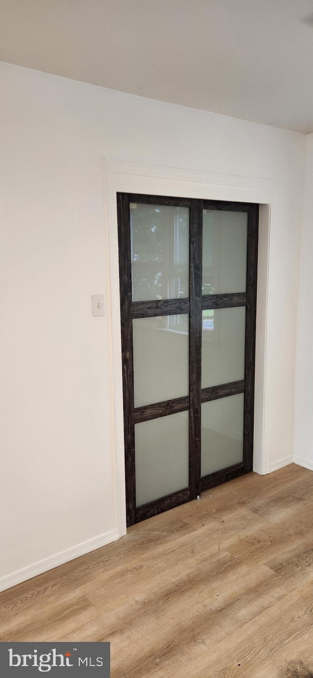 1148 Slocum St, Philadelphia, PA 19150 - empty room featuring wood finished floors and baseboards