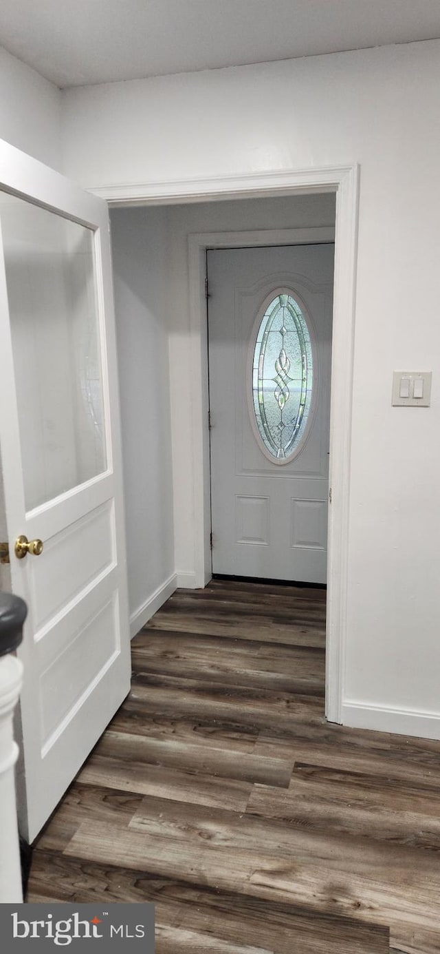 1148 Slocum St, Philadelphia, PA 19150 - entryway featuring baseboards and dark wood-type flooring