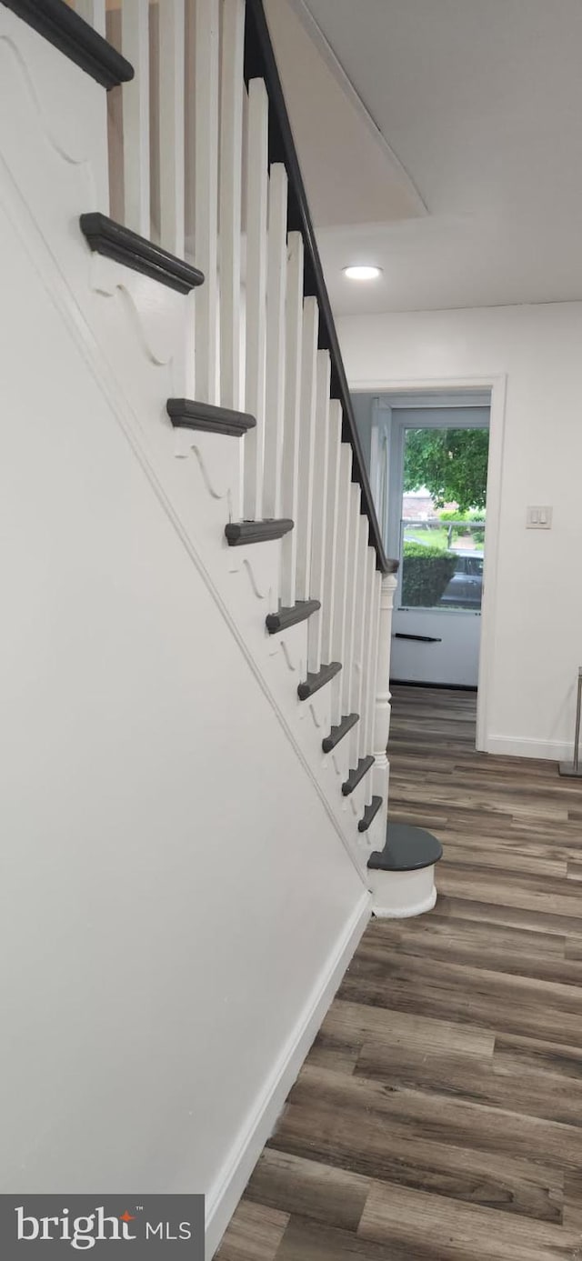 1148 Slocum St, Philadelphia, PA 19150 - stairway with wood finished floors, baseboards, and recessed lighting