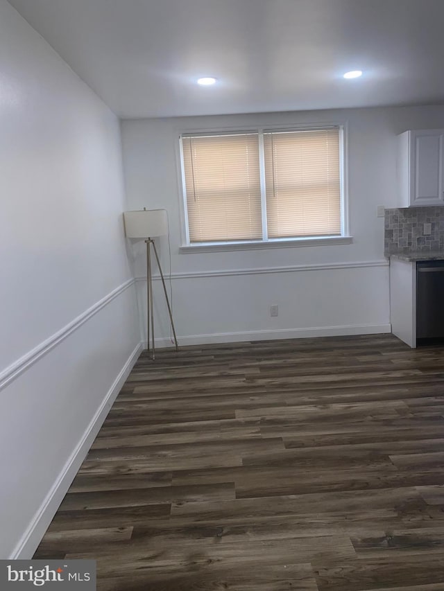 1148 Slocum St, Philadelphia, PA 19150 - unfurnished dining area featuring dark wood-style flooring, recessed lighting, and baseboards