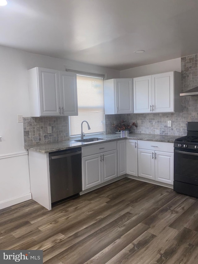1148 Slocum St, Philadelphia, PA 19150 - kitchen with stainless steel dishwasher, black gas range oven, a sink, and decorative backsplash