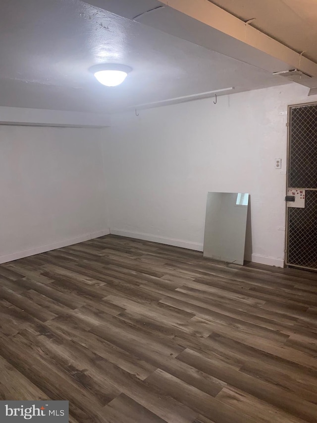 1148 Slocum St, Philadelphia, PA 19150 - finished basement featuring dark wood-style flooring and baseboards
