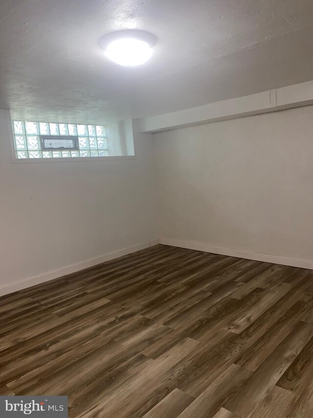 1148 Slocum St, Philadelphia, PA 19150 - spare room with dark wood-type flooring and baseboards